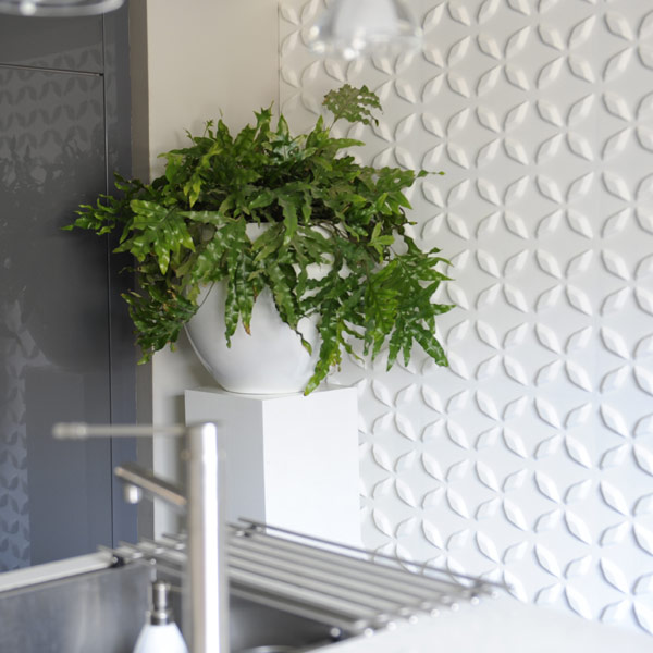 DIY Kitchen Renovation: Practical Advice on Design and Materials. DIY Kitchen Renovation: Practical Advice on Design and Materials. Textured plastic tile in white for the ecodesign near the sink