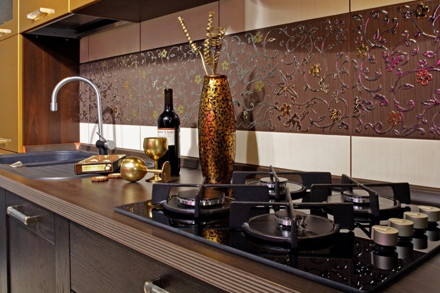 DIY Kitchen Renovation: Practical Advice on Design and Materials. Mosaic dark splashback and the vase on the tabletop
