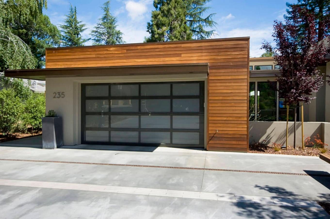 What are Residential Garage Doors? Up and over door construction at the ultramodern designed cottage