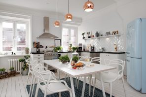 Scandinavian Style Kitchen: Interior Decoration and Furniture Ideas. Bronze lamps over the dining zone