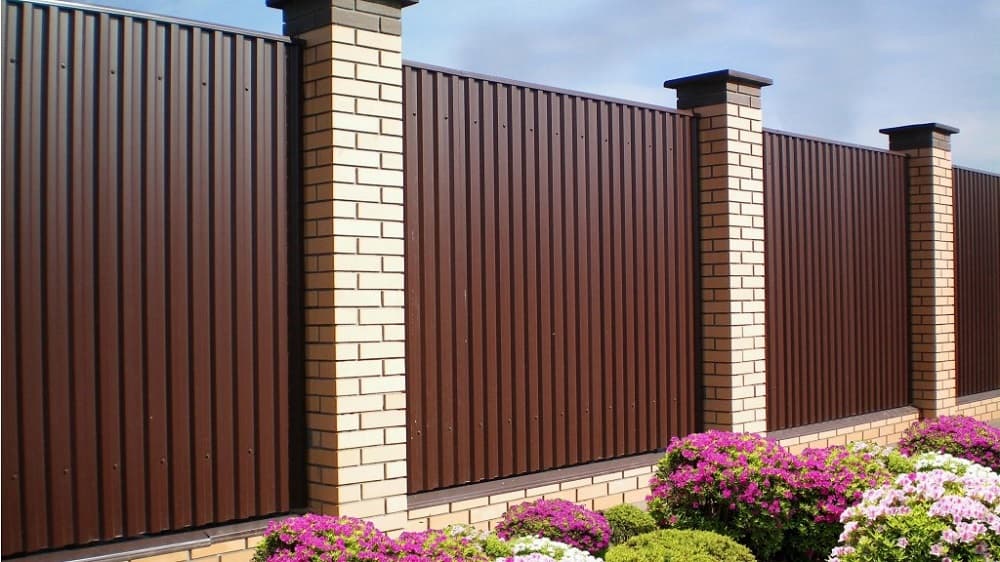 Safeguard Your Home By Installing Colorbond Fencing. The brick built pillars between fence sections