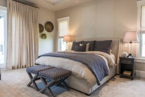 6 Places That Dust May Be Lurking in Your Home. Nice interior decoration in the bedroom in gray tone and with the ottoman at the legboard