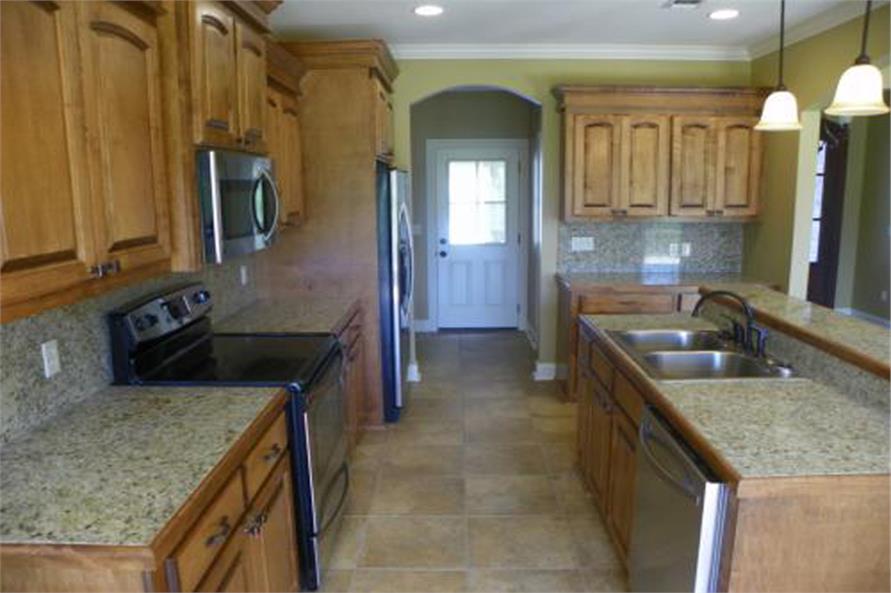 Classic styled kitchen with light wooden furniture