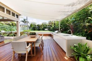 Retractable Patio Awnings Offer An Amazing Way to Upgrade Your Home. Large backyard deck patio with dining and barbecue zones
