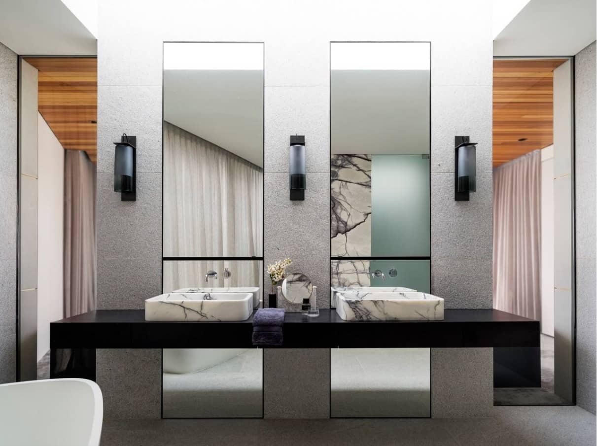 Why Do We Use Wall Sconces. Bathroom in ultramodern hi-tech style with large mirrors