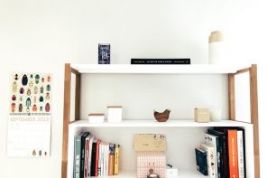 How to Tell if You’re a Minimalist or a Maximalist. White minimalist interior with bookshelf