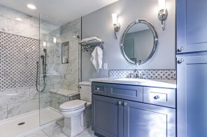 Spruce up Your Washroom: 8 DIY Shower Remodeling Ideas. Marble wall finishing in the shower zone and gray painted walls in the rest of the bathroom