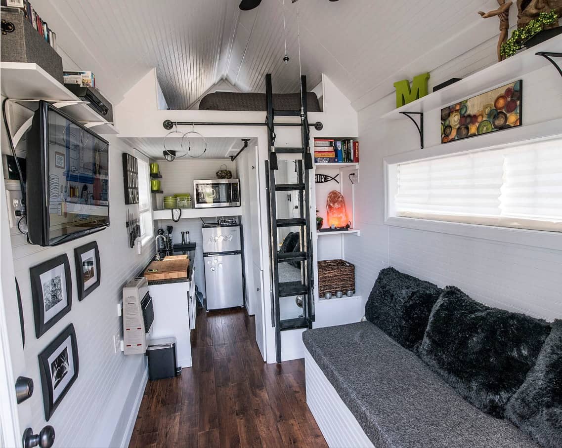 Tiny Home Interiors that Can Inspire Making Your Space more Functional. Ultrasmall but accommodating all necessary zones house in white with top bed place