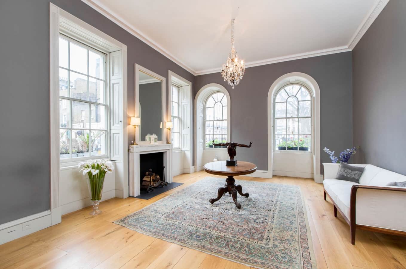 From Rubble to Riches: Your Guide to Renovating a Property in London. Gray walls and classic style for hall