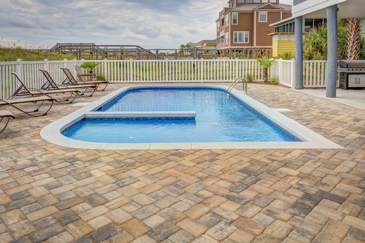 The Advantages of Using a 3D Pool Design Software. Beautiful open pool at the neat tiled backyard