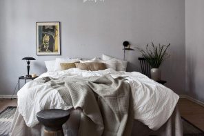 Hygge Interior Design Style and Life Philosophy: Cozy Danish Tradition. Gray wall and fluffy carpet