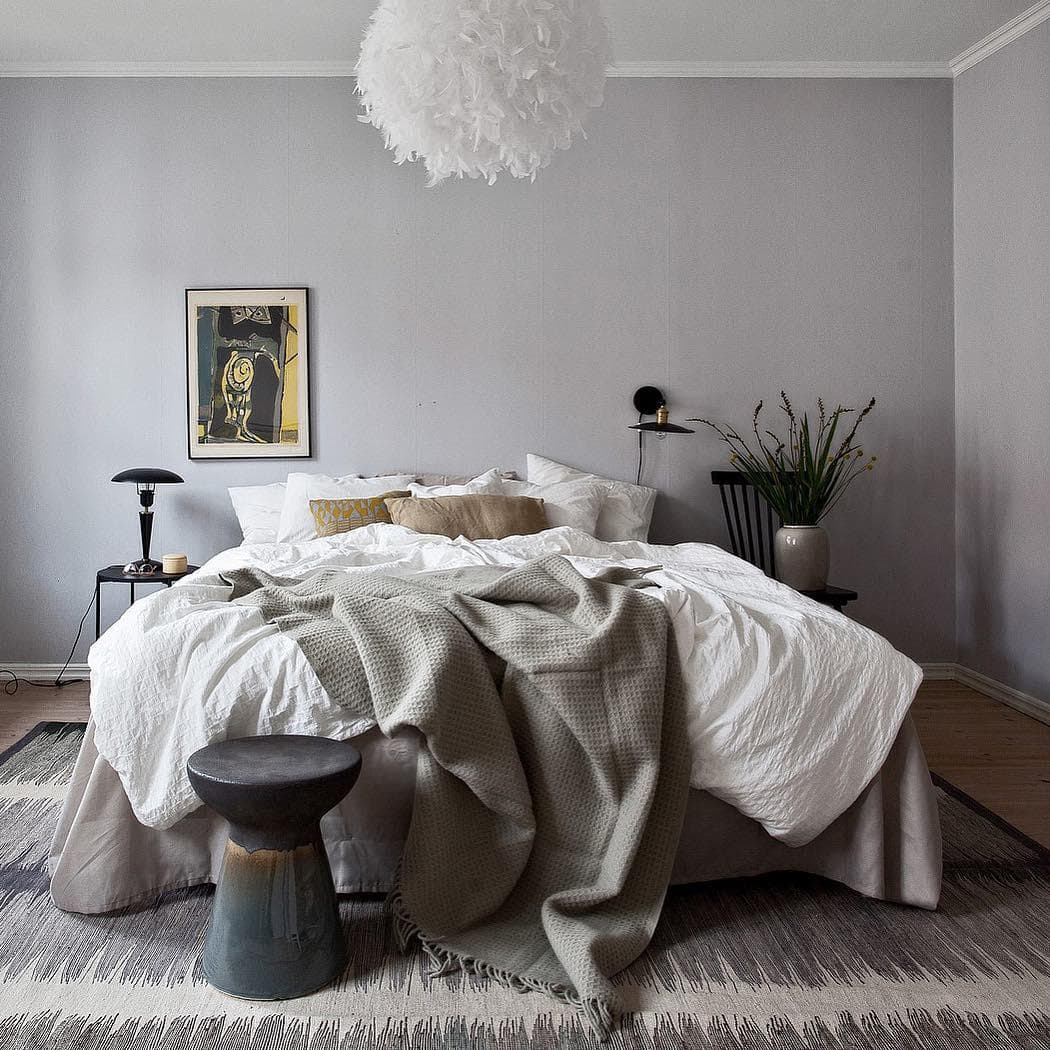 Hygge Interior Design Style and Life Philosophy: Cozy Danish Tradition. Gray wall and fluffy carpet