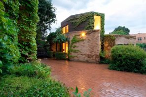 8 Benefits of Installing Brick Pavers. Greenery and pavement for suburb English style house