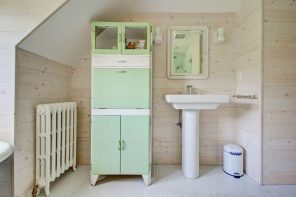 9 Great Bathroom Design Trend for 2020 and Beyond. Mint cabinet and wooden trimming for retro space