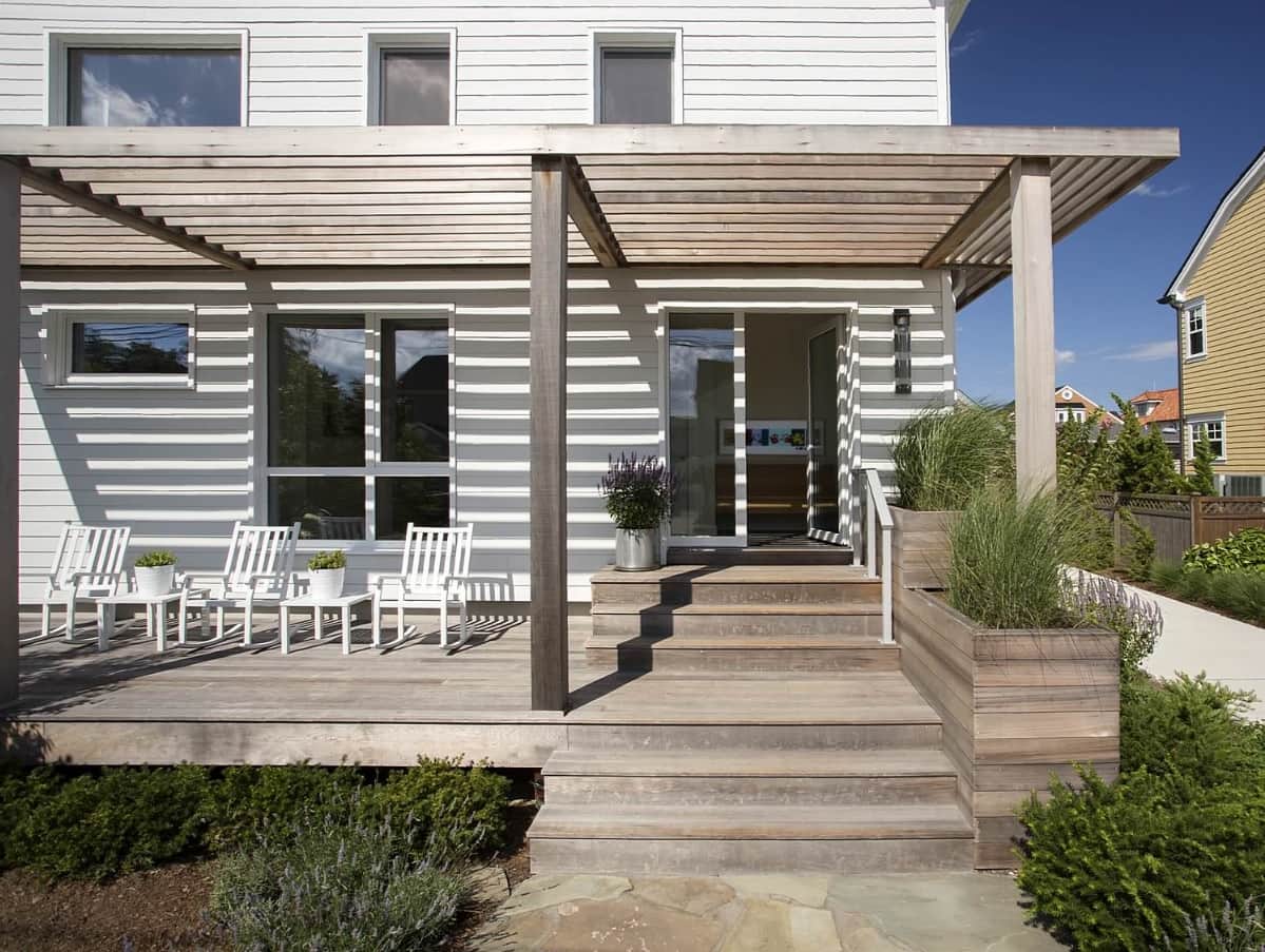How to Design A Storm-Resistant Home. Lattice over the patio zone for Traditional styled house
