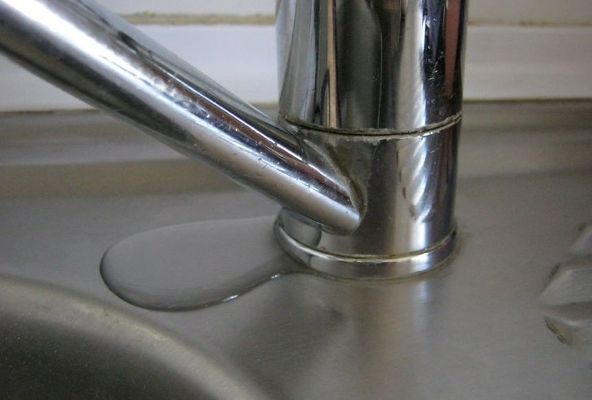 kitchen sink faucet leaking at top