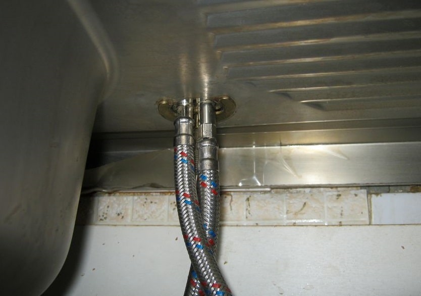 Kitchen Sink Faucet Leaking at Base: Diagnostics and Troubleshooting. The view under the faucet