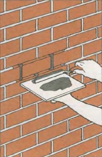 Masonry Pointing: Joints Recovery to Spalling Brick Repair. Seam recovery with joint filler