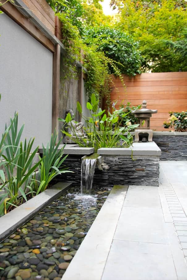 Landscaping for Pets: How to Make a Pet-Friendly Yard. Great ecodesign move with the water gutter at the pavement