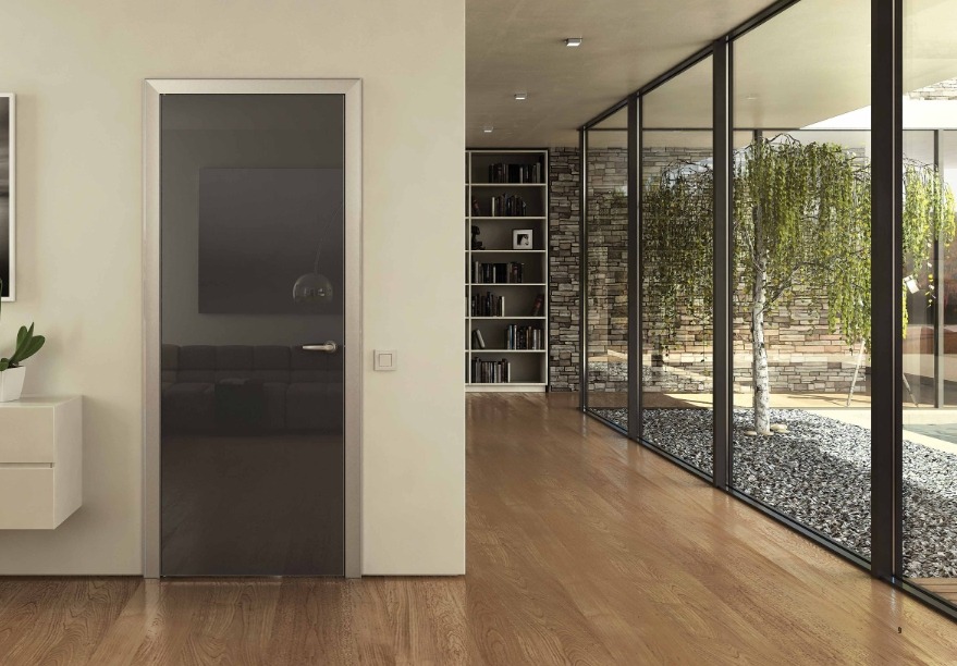 Laminated floor and dark semi-transparent interior glass door