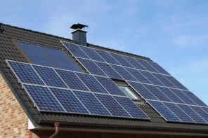 Why Going Green Can Help Sell Homes Faster. Roof with bunch of installed solar panels