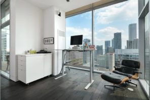 Adjustable Desk to Make Your Home Office more Universal. Modern apartment with white walls and panoramic window