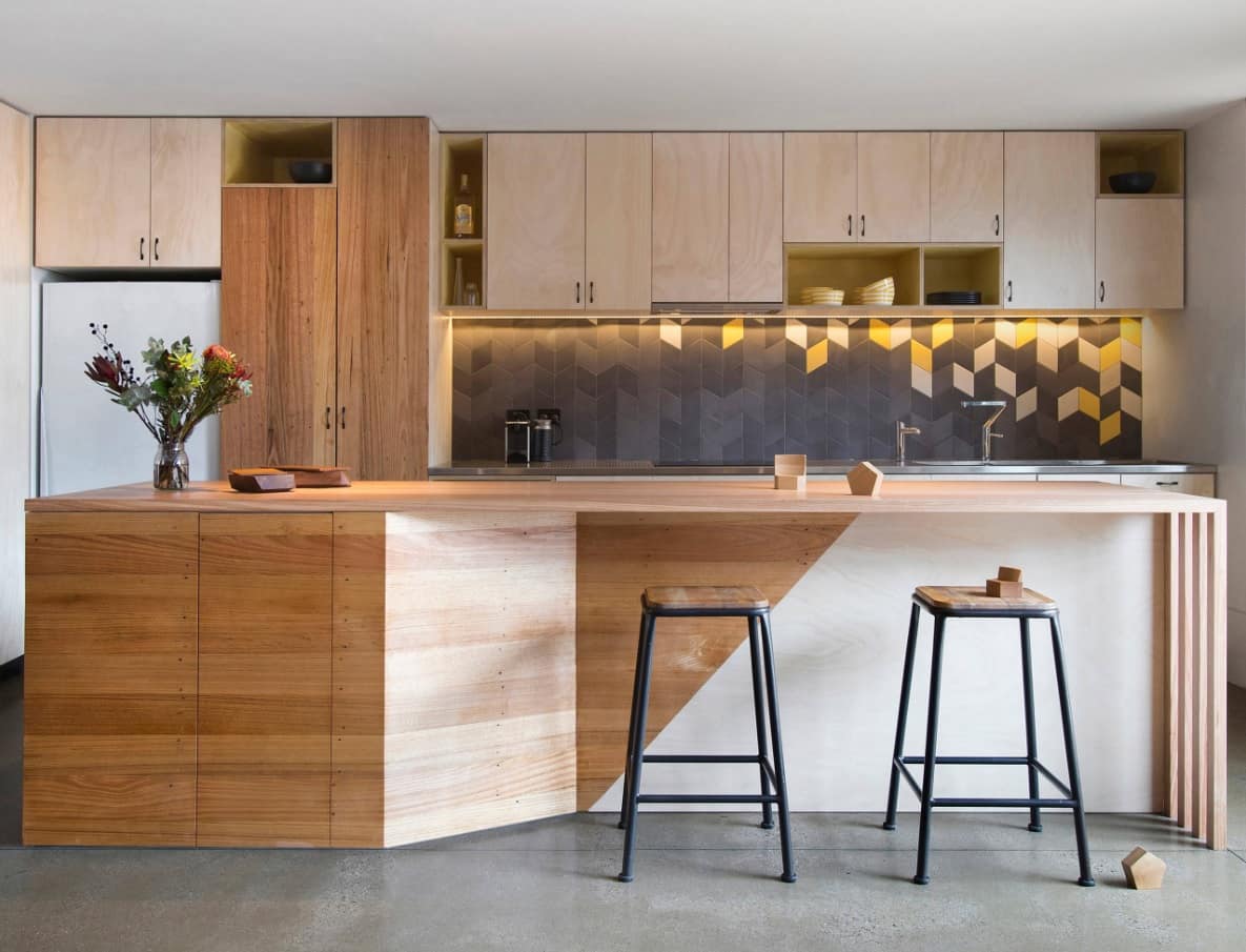 10 Amazing Ways to Give Your Kitchen a New Look. Wooden sheathed island and geometry tiles on the splashback