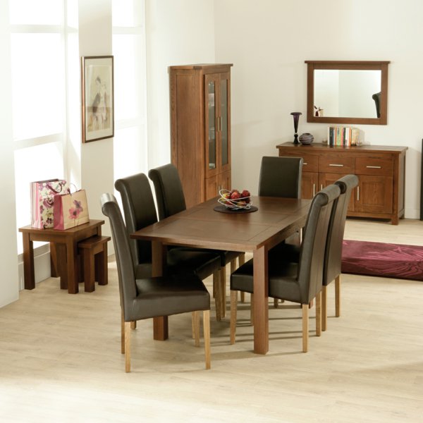Chic wooden chair group at the brown table for classic room