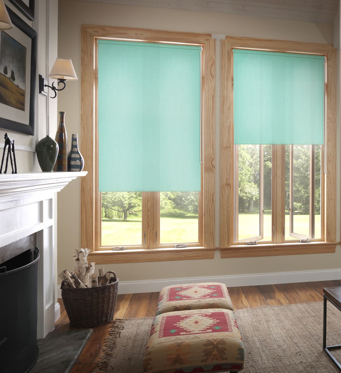 Azure accent roller blinds for wooden windows of casual living room with large mantelshelf fireplace