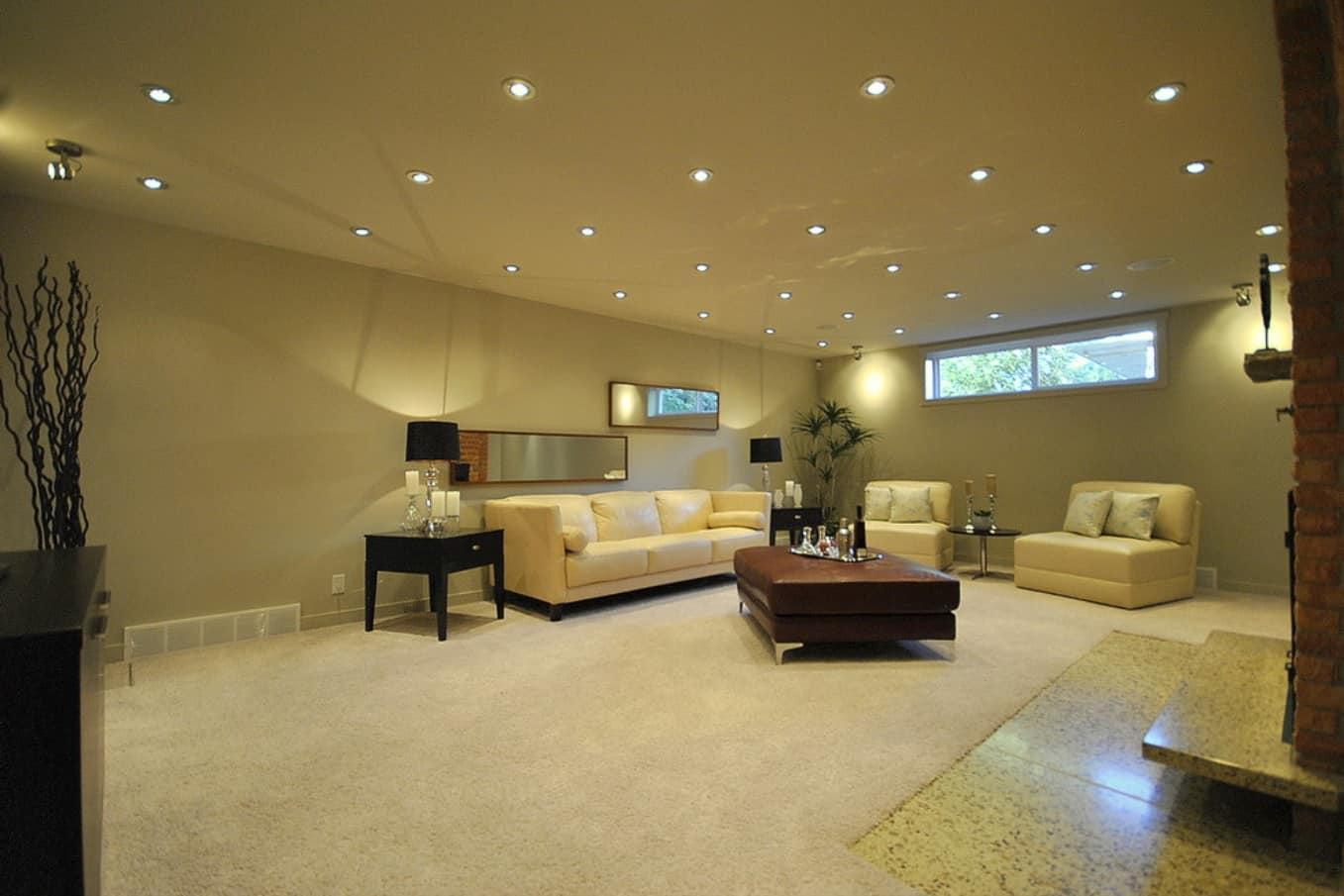 Disclosures You Should Make When Selling Your Home in Edmonton. Large living room in mild beige color palette 