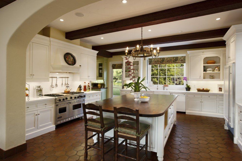 Colonial Style Kitchen as Distinctive Feature of Chic Interior. Ethnic minimalism with exposed dark ceiling beams