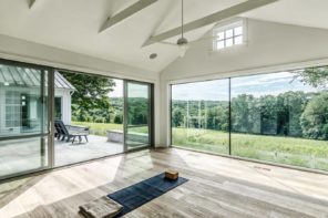 5 Ways To Create A Meditation Space In Your Home. Spacious white colored lounge room with panoramic window panels