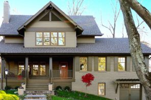 Mezzanine in the House: Difference from Loft, Construction Advice. Classic designed house with complex roof and sandy colored facade