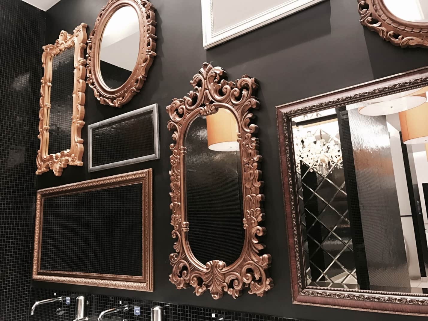 6 Beautiful Wall Mirrors to Consider for Your Home. Dark accent wall with hanging mirrors for exquisite decoration