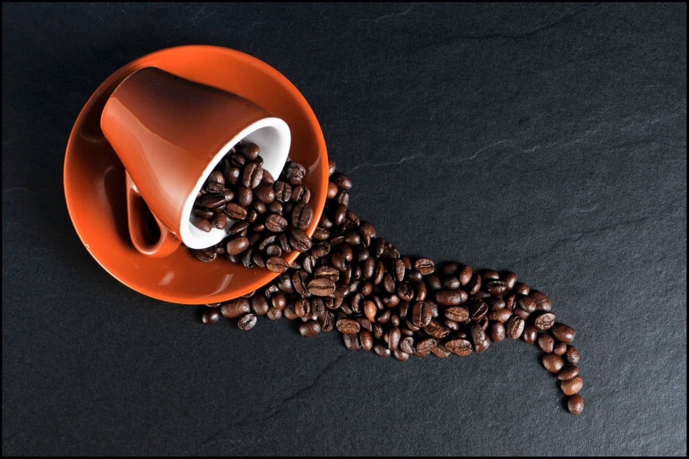 This Is What You Need to Do If You Spilled Coffee on Your Carpet. The cup full of coffee grains