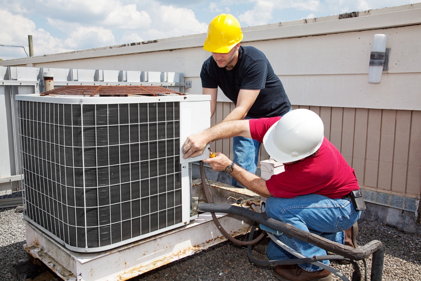 Are HVAC Maintenance Plans Worth It? Installing the HVAC system at the roof