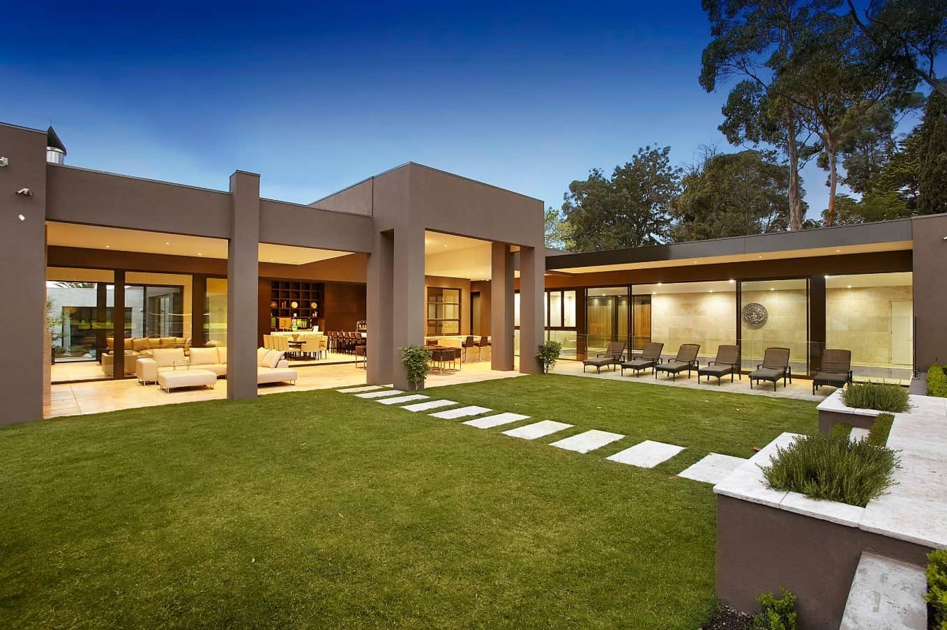 Great Ways to Upgrade Your Yard. Supermodern house with columns and squared forms