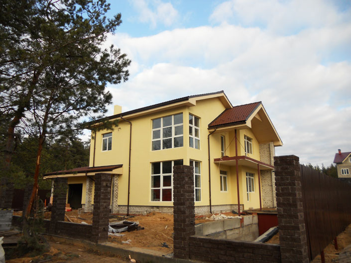 5 Reasons To Build Your Own House. The house in the forest from scratch with yellow facade