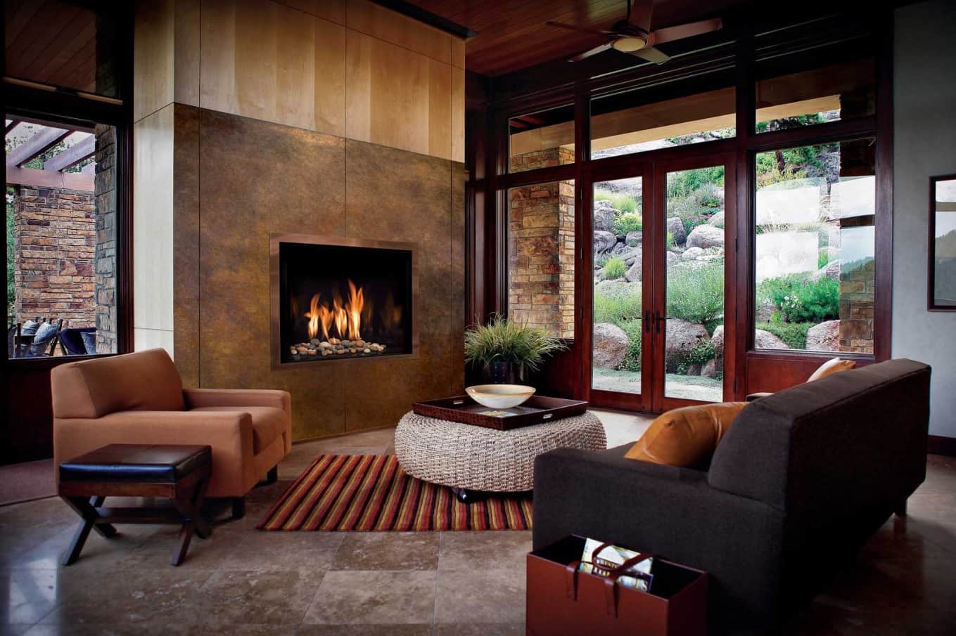 6 Ways You Can Use Cleaner Energy Without Putting Panels on the Roof. Modern natural oriented chic interior design of the house with African touch and electric fireplace