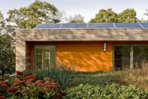 8 Tips to Conserve Energy in Your Home. Casual designed house with yellow facade and sustainable technologies inside