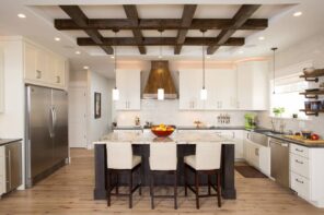 House Remodeling Costs: How to Track Spending Efficiently. Chalet styled kitchen with dark wooden crate at the ceiling and suspended light over the dining zone