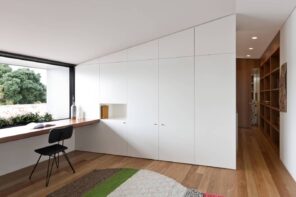 4 Tips to Create a Productive Office Space. Scandinavian minimalistic interior decoration with seamless storage wall-height cabinet