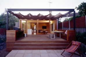 Great idea of cloth awning over the patio zone at the backyard