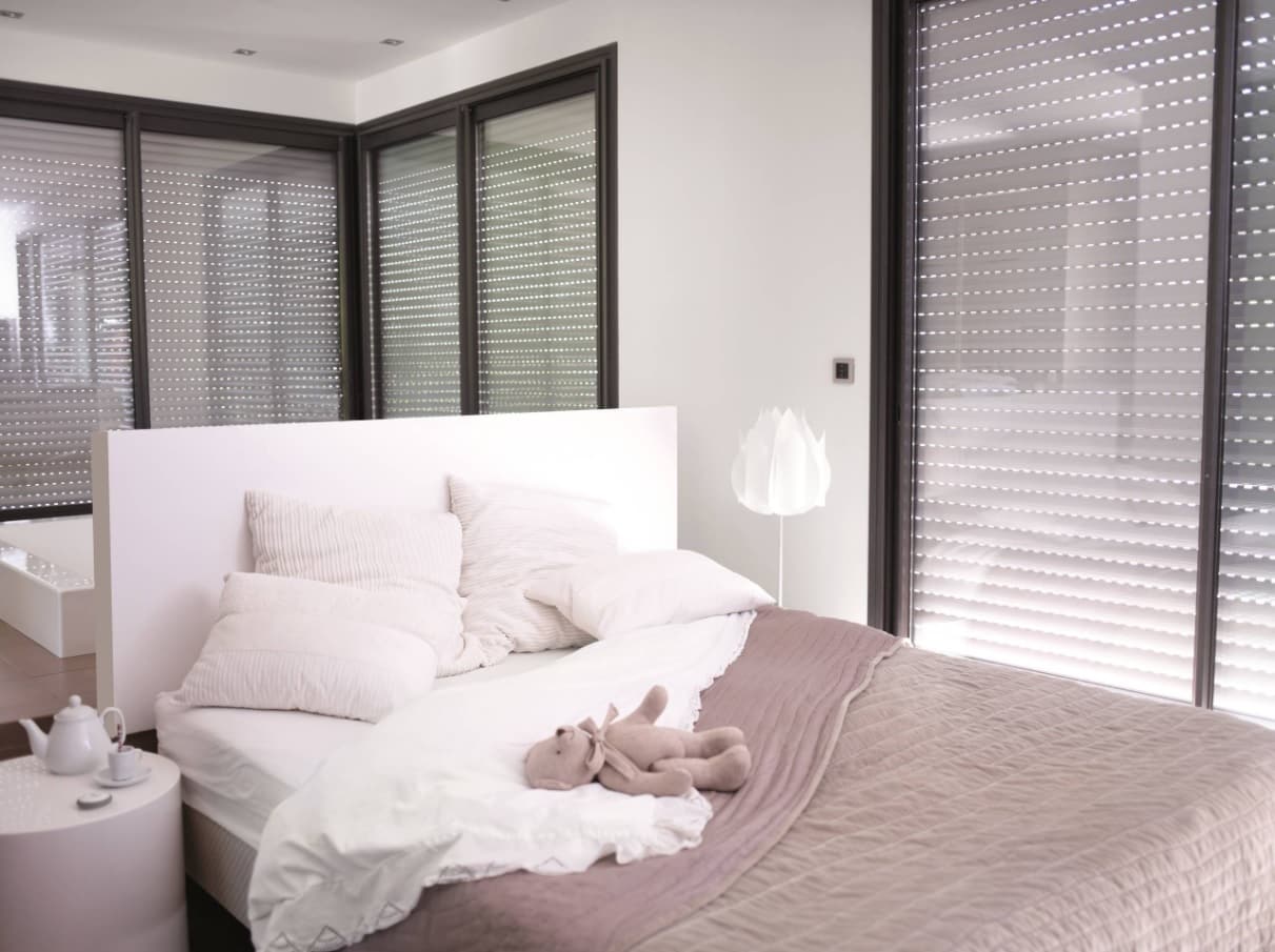 How to Increase the Security in Your Home. Roller shutter in the contemporary styled bedroom