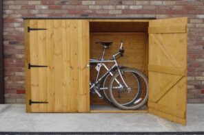 5 Steps to Select the Right Bike Shed. Simple wooden garage for a bicycle