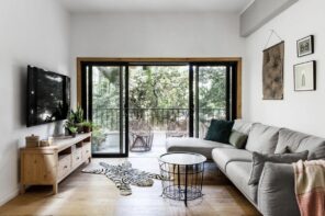 Selling Your House? Here Are 6 Ways to Make It More Attractive to Buyers. Black framed balcony door block for the modern styled living room with TV on the stand and zebra pelt imitation on the floor