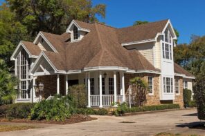 Ambler Roofers Answer - Avoid These Five Mistakes When Choosing a Roofer. Classic English colonial styled house with low porches and complex gable roof