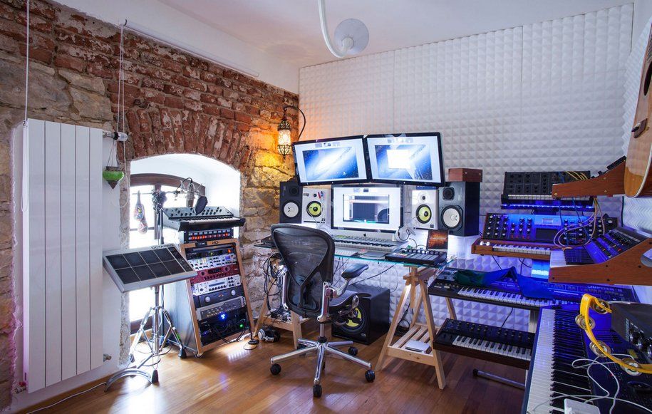 How to Design a Functional Home Music Studio. Light interior with accent brickwork wall and whitewashed texture for casual styled space