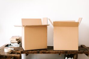 Five Tips To Organize Your New House. Cardboard boxes with personal things of new homeowners