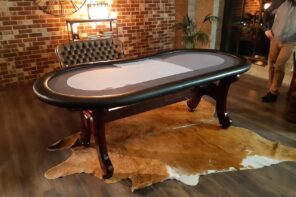 Placing Poker Tables in Small Spaces. Small table for large living room to take up less area. Classic table with wooden legs